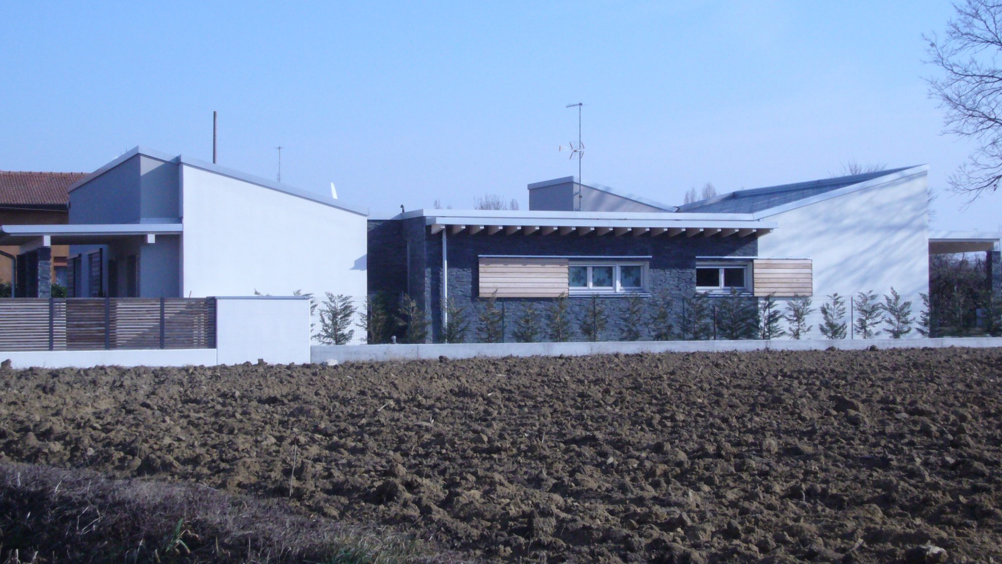 Modern duplex with stone façade