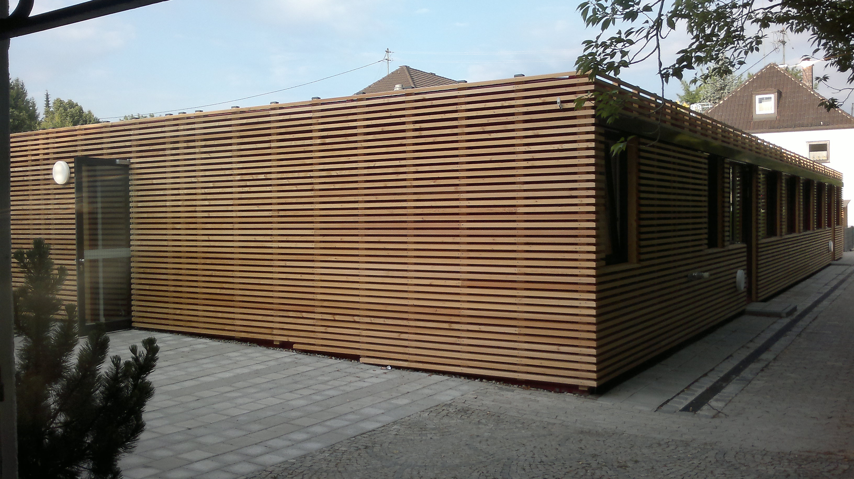 Beautiful larch facade on a school in Italy